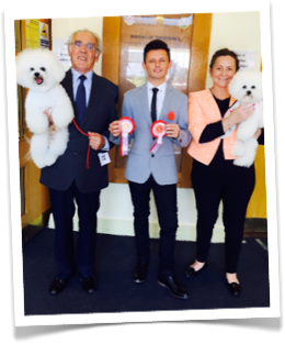 Arthur proudly shows off his first certificate.